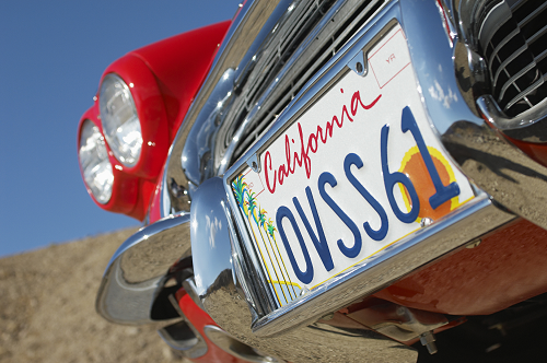 a close up of a red classic car